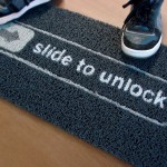 slide-to-unlock-iphone-doormat-black
